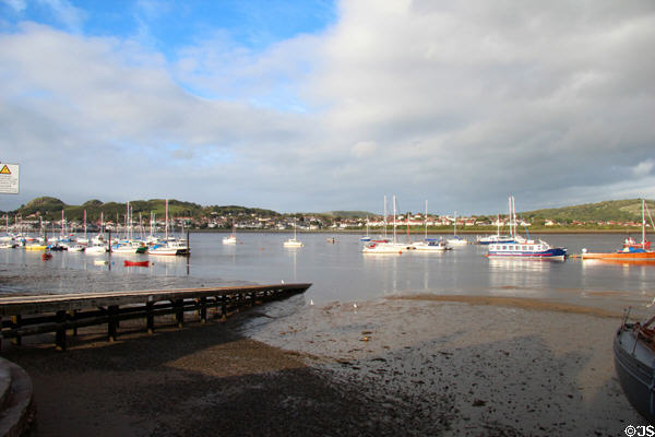 Jetty reaching into Conwy harbor. Conwy, Wales.