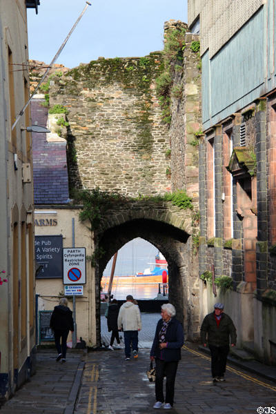 Gateway through walls between old town & harbor. Conwy, Wales.