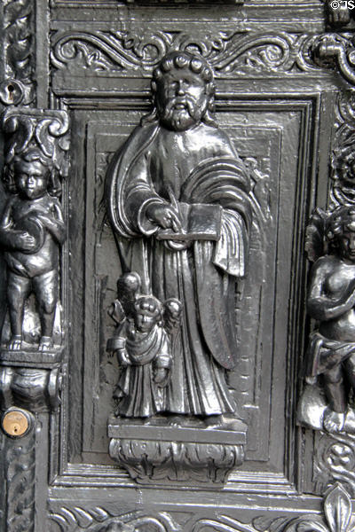 Carving of St Matthew the Evangelist, with an angel, his symbol, at Plas Newydd. Llangollen, Wales.