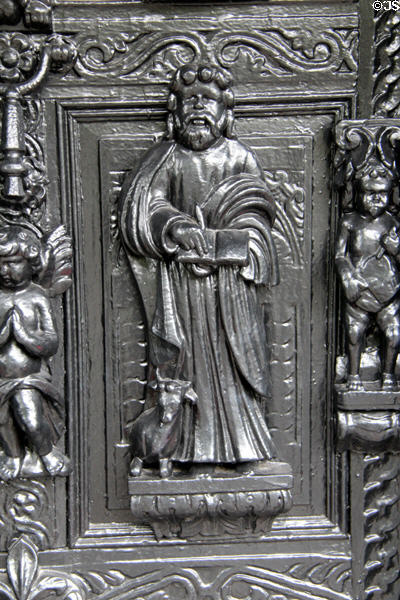 Carving of St Luke the Evangelist with a bull, his symbol, at Plas Newydd. Llangollen, Wales.