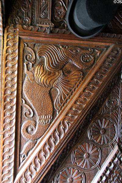 Detail of carved wood panel at Plas Newydd. Llangollen, Wales.