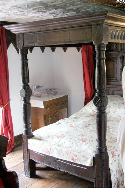 Four poster bed with carved posts, back & upper panels at Plas Newydd. Llangollen, Wales.