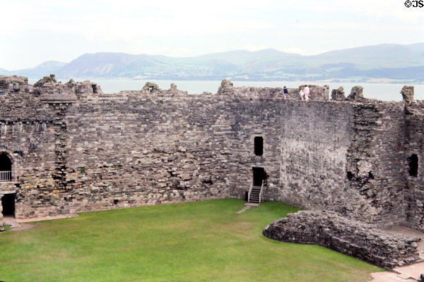 Ruins of Beaumarais Castle (early 14thC) on the island of Anglesea, overlooking the Menai Straight was last castle built by Edward I & never completed. Beaumarais, Wales.