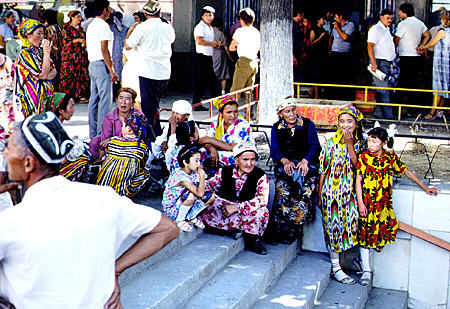 People in traditional dress in Tashkent market. Uzbekistan.