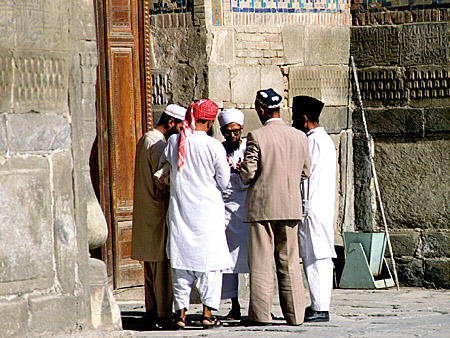 Muslim visitors at Registan in Samarkand. Uzbekistan.