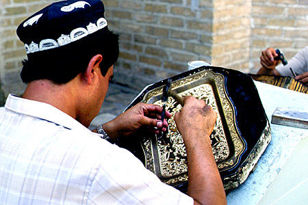 Engraving metal in Bukhara. Uzbekistan.