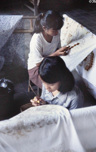 Making Batik by drawing in wax. Bali, Indonesia.