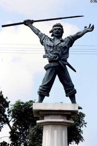 Liberation monument of fighter with gun & kris (ethnic knife). Bali, Indonesia.