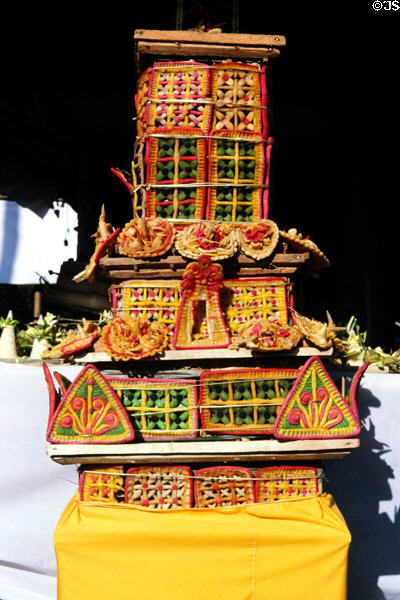 Highly decorated temple offering of food. Bali, Indonesia.