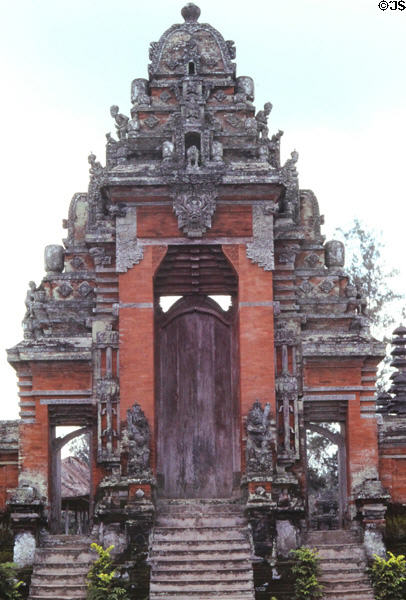 Carved temple entrance in mist. Bali, Indonesia.
