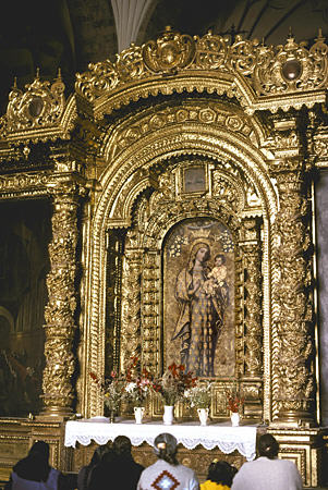 Baroque altar just inside main door of Cusco Cathedral where in colonial days Incas were only allowed this far. Peru.