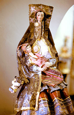 Virgen La Leche Con Diadema y Niño Con Rayos by Hilario Mendivil in Taller Hilario Mendivil Museum, Cusco. Peru.