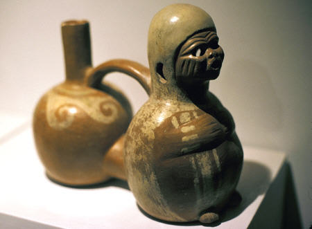 Mochika ceramic jug with face (100 BCE) in Incan Museum, Cusco. Peru.