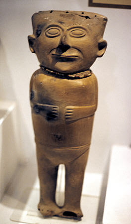 Chancay ceramic human figure (800 CE) in Incan Museum, Cusco from on coast north of Lima. Peru.