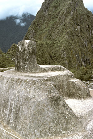 Intihuatana, Hitching Post of the Sun atop observatory hill, Machu Picchu points NW to SE with four corners pointing N, S, E, W, used to measure equinox & solstice, also used as al. Peru.
