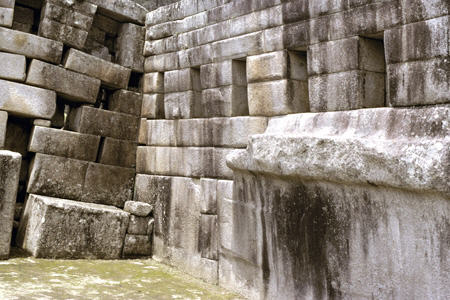 Detail of main temple separation caused by water lifting ground at Machu Picchu. Peru.