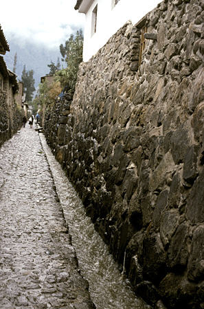 Original Incan walls and street of Ollantaytambo. Peru.