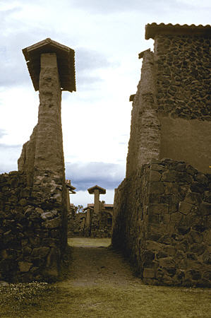 Street of the Sun with houses at Temple of Viracocha in Ragchi. Peru.