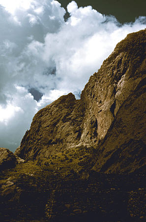 Pucara ruins (400 BCE-500) at base of important cliff. Peru.