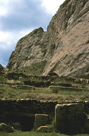 Pucara ruins at base of landmark cliff. Peru.