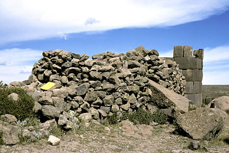 Incomplete tomb with stone ramp to get blocks to top at Silustani. Peru.