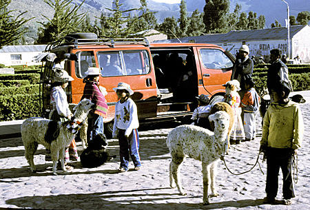 Locals come out to meet tour van in town of Yanque in Colca Canyon. Peru.