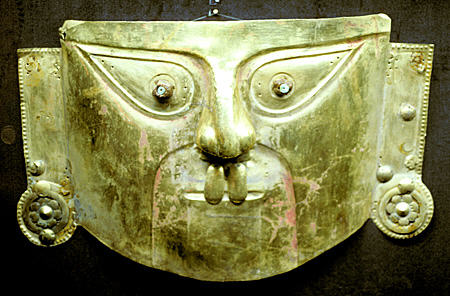 Lambayeque Mask with turquoise in Gold Museum, Lima. Peru.