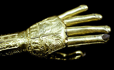 Lambayeque hand in gold leaf in Gold Museum, Lima. Peru.