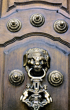 Lion door knocker on Archbishop's Palace, Lima. Peru.