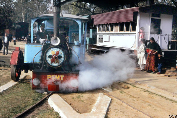 Steam monorail (1907) designed to run on one steel rail while balancing wheel ran on flanking public road in operation in Delhi rail museum. Delhi, India.