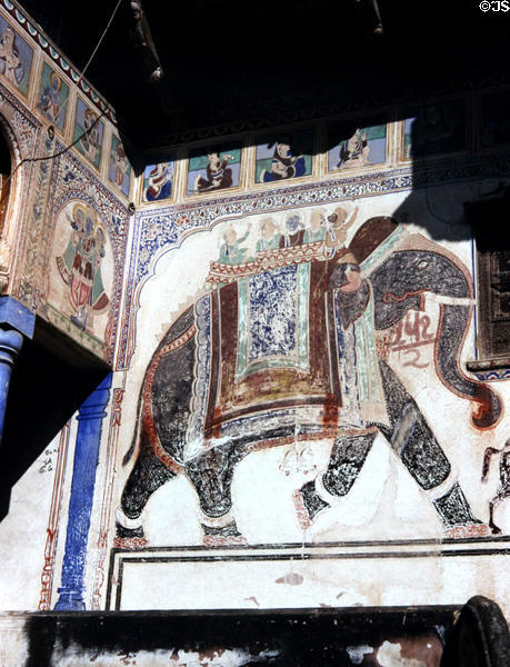 Painting on wall of haveli (manor house) shows decorated elephants. Mandawa, India.