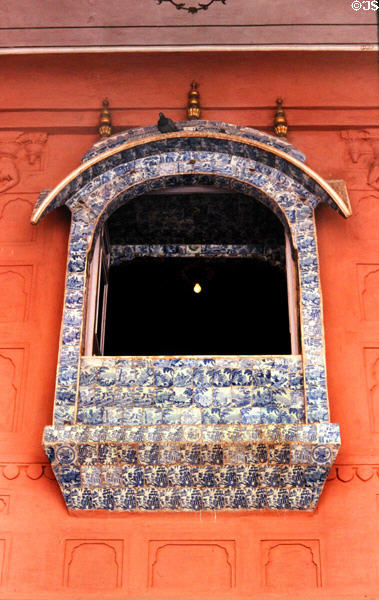 Ornately tiled window on fort in Bikaner. India.