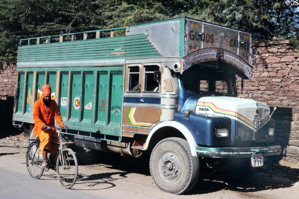 Transport truck & bicyclist near Jodhpur. India.