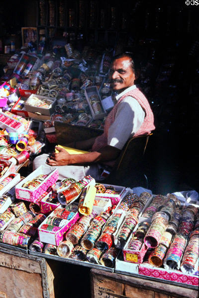 Vendor selling Lak bracelets on a Jaipur street. India.