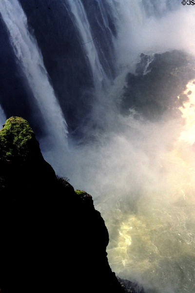 Mist rising from Victoria Falls. Zimbabwe.