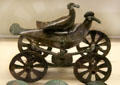 Bronze age grave goods birds riding on chariot at Museum of Natural History. Vienna, Austria.