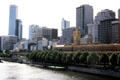 Flinders Street Station & Melbourne skyline from south bank of Yarra River. Melbourne, Australia.