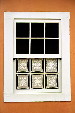 Typical lace window coverings in a home in the village of Tiradentes. Brazil