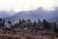 Scene in upper Paro valley with ruins of Drugyel Dzong. Bhutan.