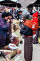 Women converse at the Saturday market in Thimpu. Bhutan.