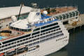 Stern of Canada Place mimics stern of Tahitian Princess cruise ship. Vancouver, BC.