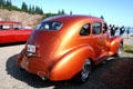 40s vintage orange hotrod at car rally. NB.