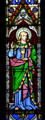 Stained glass Saint John with chalice & serpent in Christ Church Cathedral. Fredericton, NB.