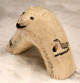 Inuit bone carving representing bear by Adamie Papyarluk of Kuujjuaraapik, Quebec at National Gallery of Canada. Ottawa, ON.