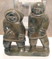 Inuit soapstone carved man & woman by Kiugak Ashoona of Tariugajak camp, NWT at National Gallery of Canada. Ottawa, ON.