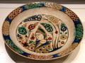 Fritware dish with underglaze painting of court lady from Iran at Aga Khan Museum. Toronto, ON.