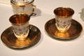 Meissen porcelain beakers & saucer decorated with gold leaf attrib. Johann Georg Funcke at Gardiner Museum. Toronto, ON.