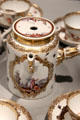 Chocolate pot detail of Meissen porcelain tea, coffee, chocolate service decorated with Oriental scenes in white quatrefoils in private collection. ON.