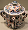 Covered posset pot with red, blue & green flowers on English delftware from Bristol or London at Gardiner Museum. Toronto, ON.
