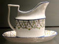 Bone china creamer & stand by Minton of Stoke-on-Trent, England at Gardiner Museum. Toronto, ON.